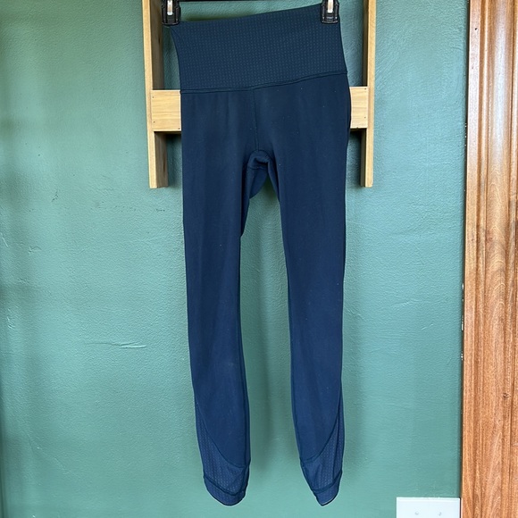 Lululemon Leggings. Size 2. Fixed hole in mesh panel (pictured). Navy Blue. - Picture 6 of 8
